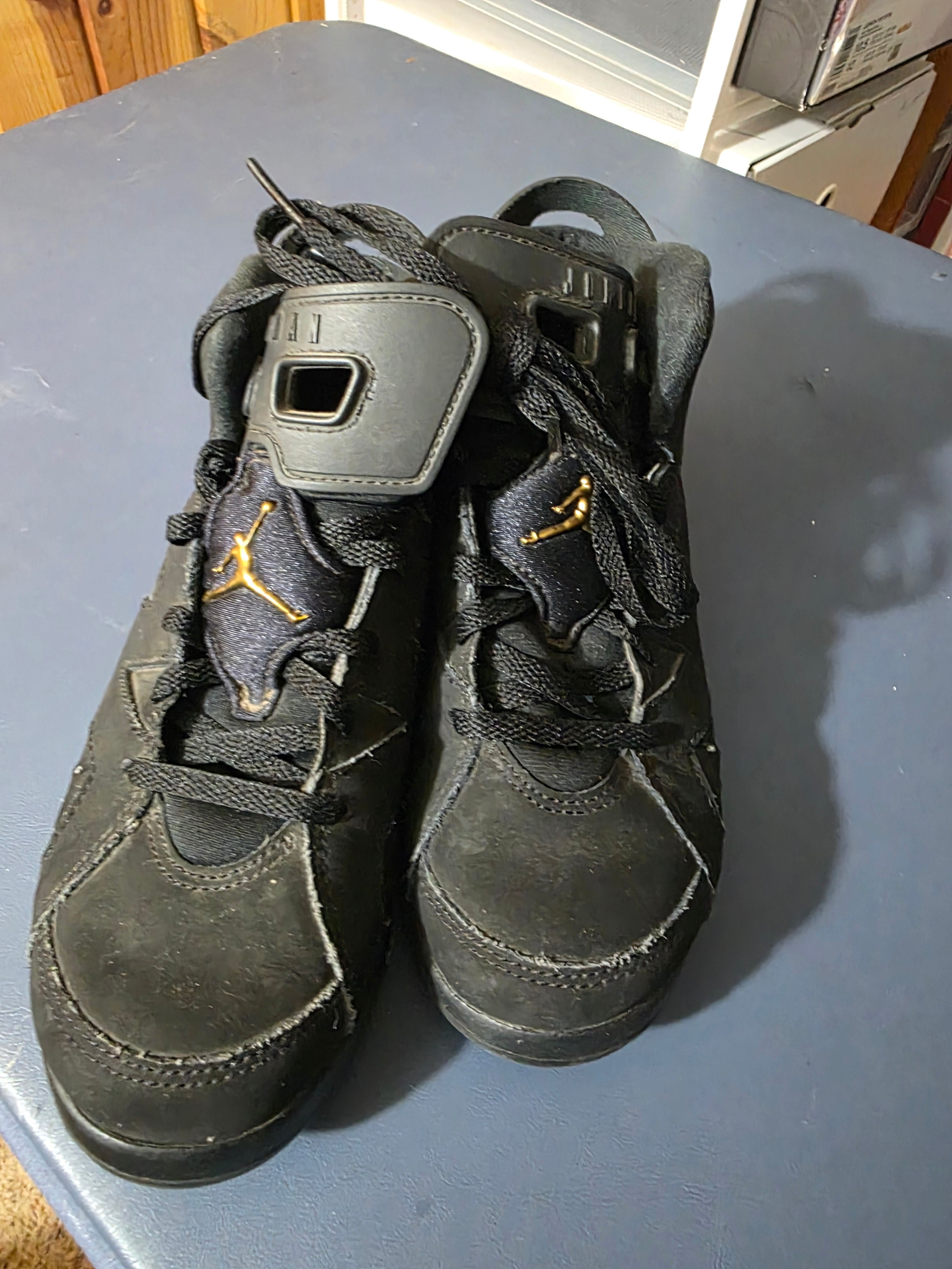 Jordan 6 retro DMP Black/ Gold,  size 2.5y.