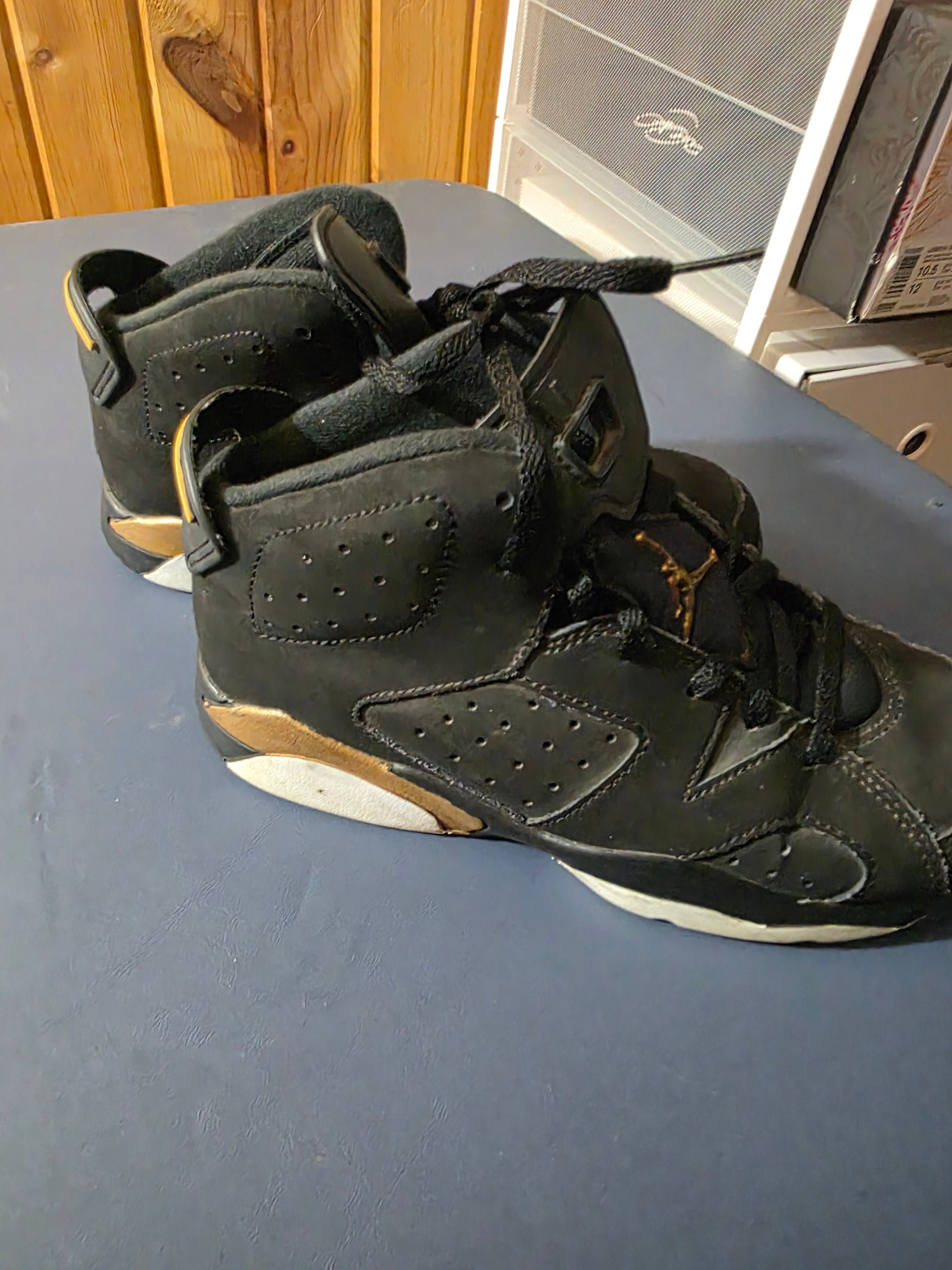 Jordan 6 retro DMP Black/ Gold,  size 2.5y.